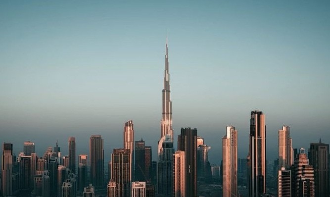 Dubai Downtown skyline with Burj Khalifa at sunset